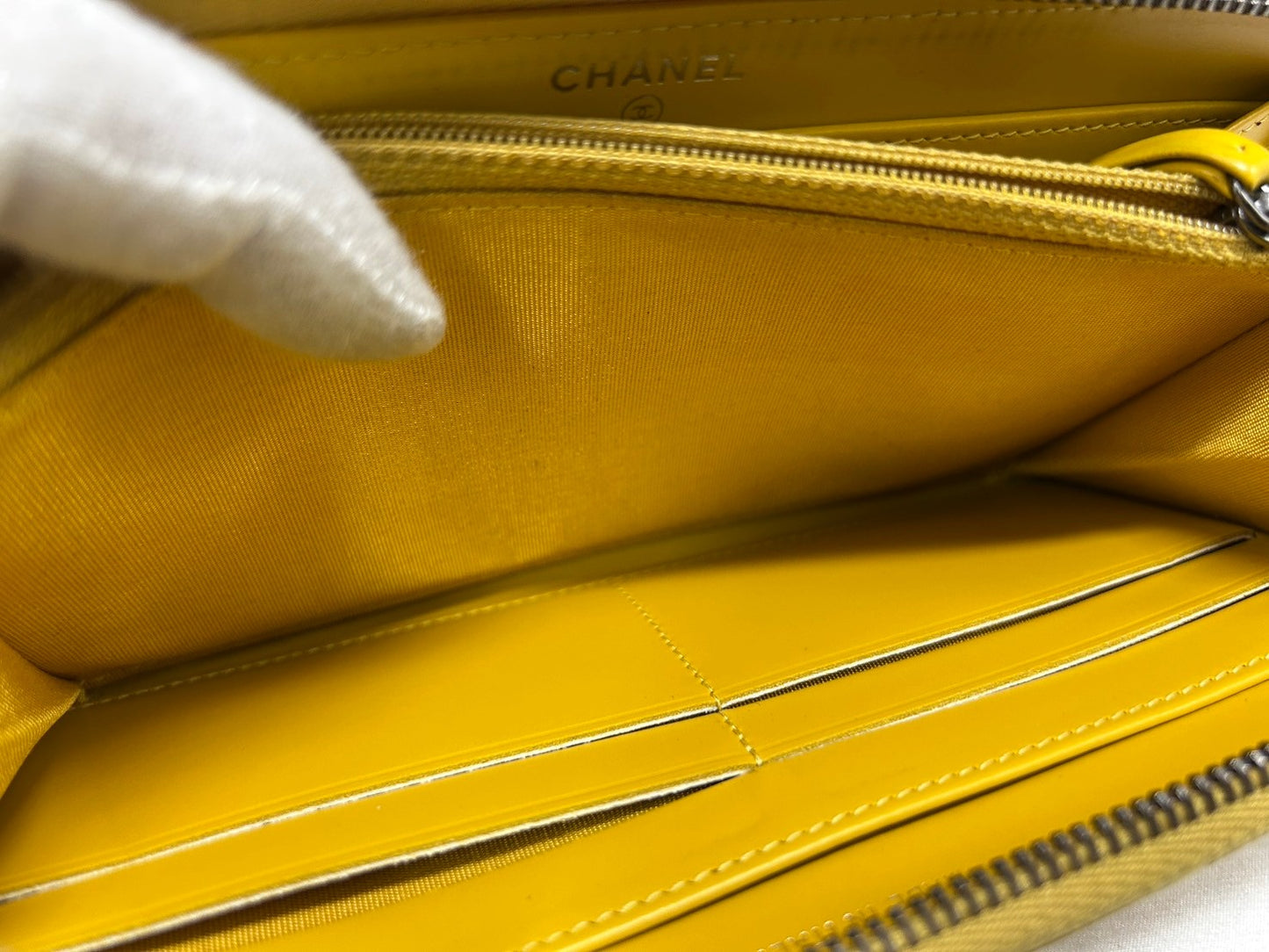 CHANEL Round zipper wallet yellow