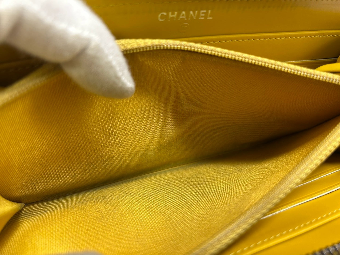CHANEL Round zipper wallet yellow