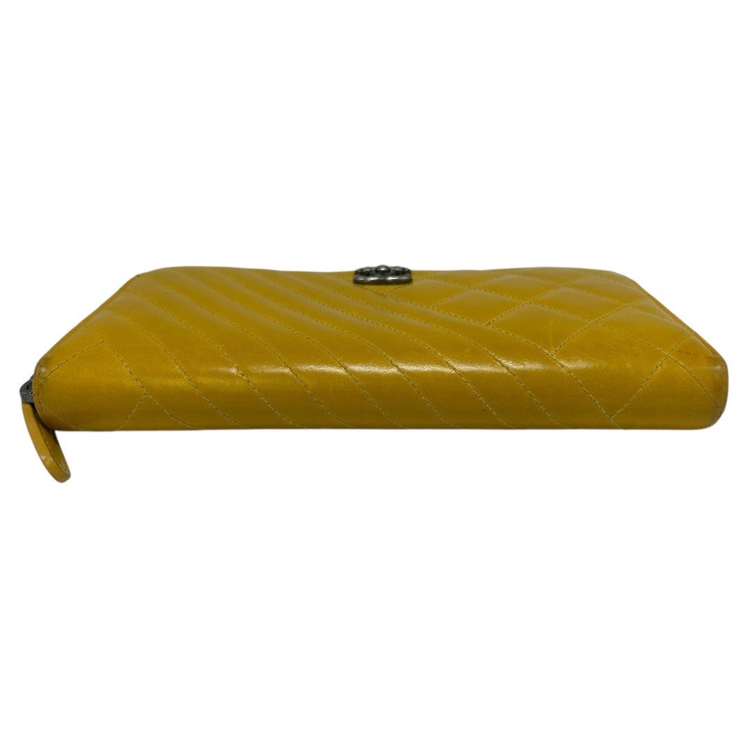CHANEL Round zipper wallet yellow