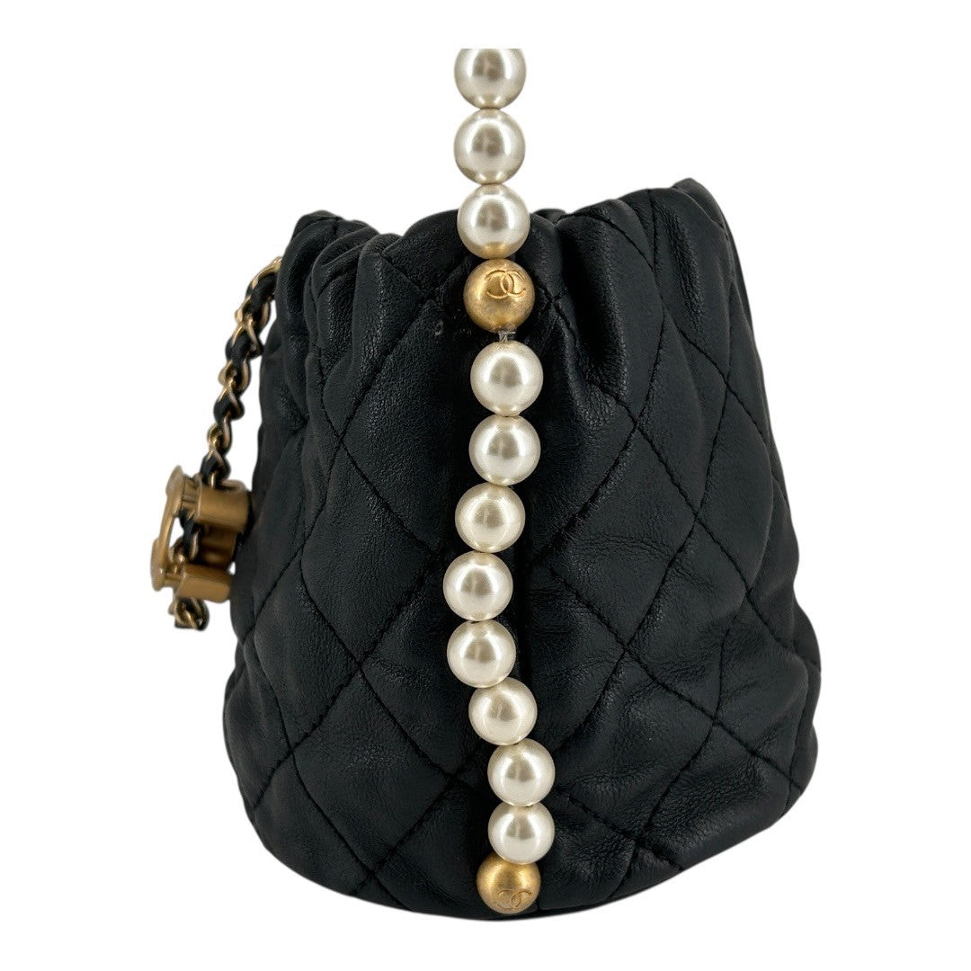 CHANEL Drawstring shoulder bag with chain shoulder strap in lambskin